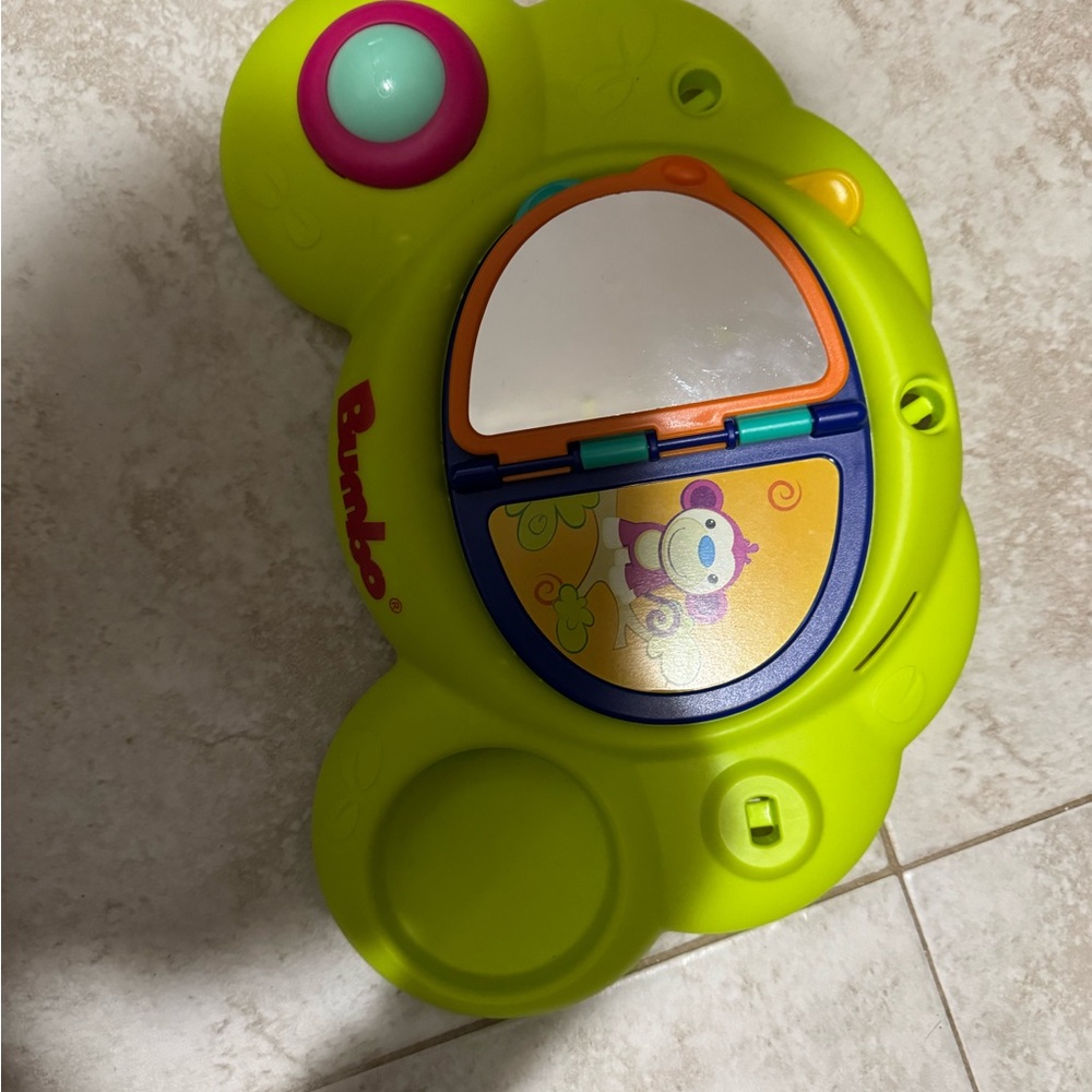 Green and Pink Learning Toy with Reflective Surface